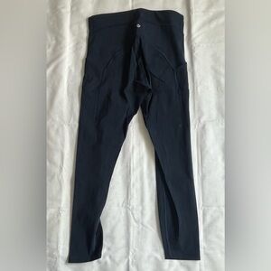 Lululemon. Size 10. Power Thru with pockets. Navy Blue.